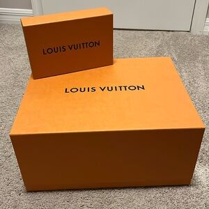 Louis Vuitton bucket purse and matching wallet.